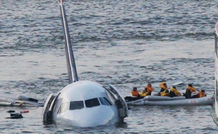 Jan. 15, 2009: As the U.S. Airways jet they had been on sinks into the Hudson River, passengers are rowed away. This isn't