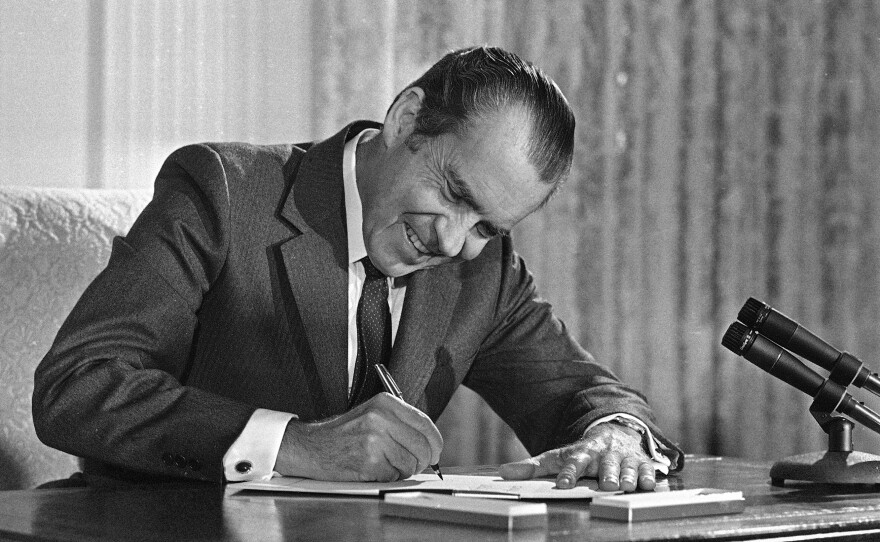 President Richard Nixon signed the National Cancer Act at the White House on Dec. 23, 1971.