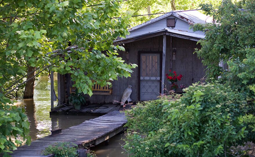 Occasional flooding is part of life on the batture, between the Mississippi River and the levee.