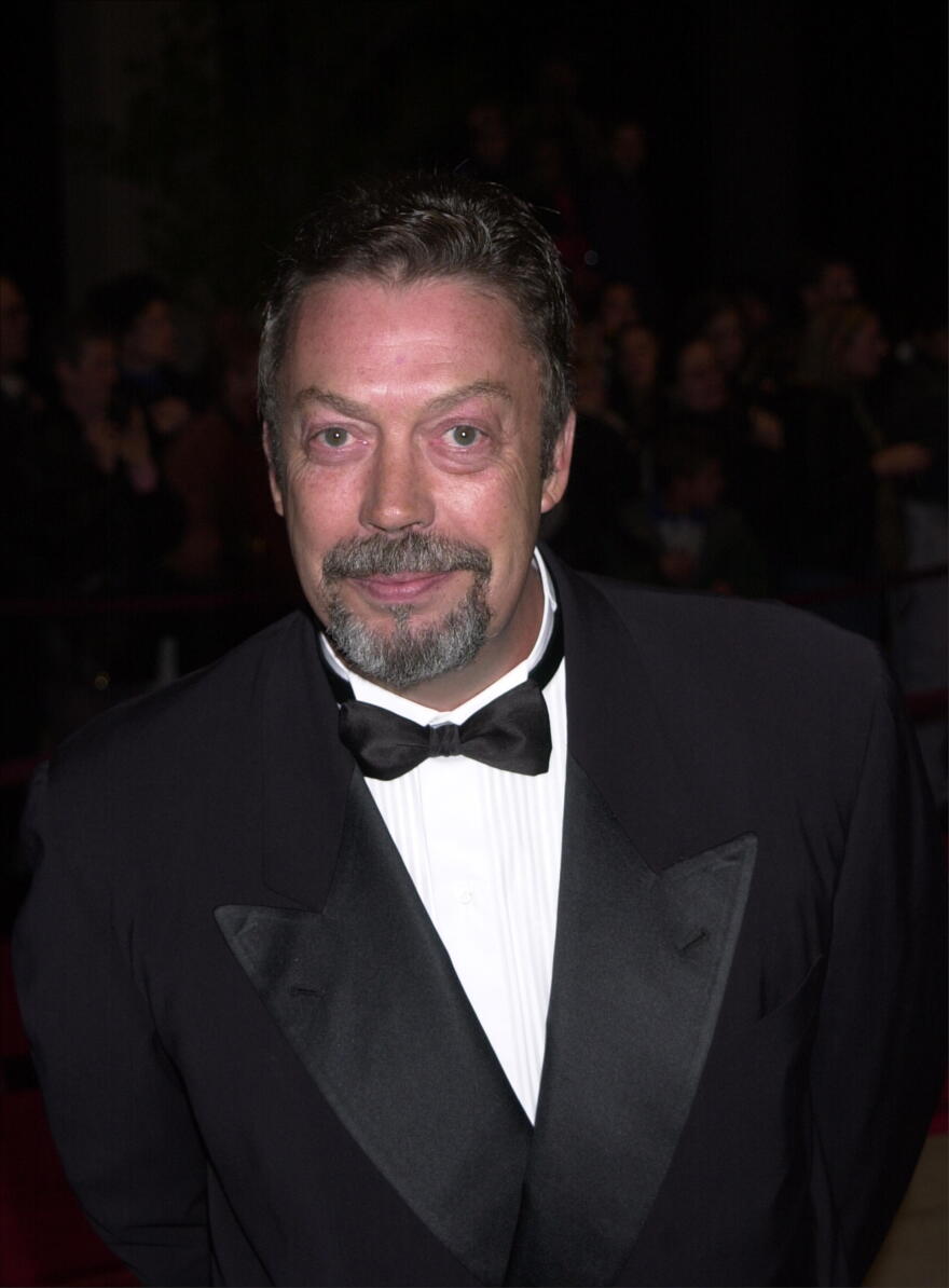 Tim Curry arrives at the Palm Springs International Film Festival gala in January 2001.
