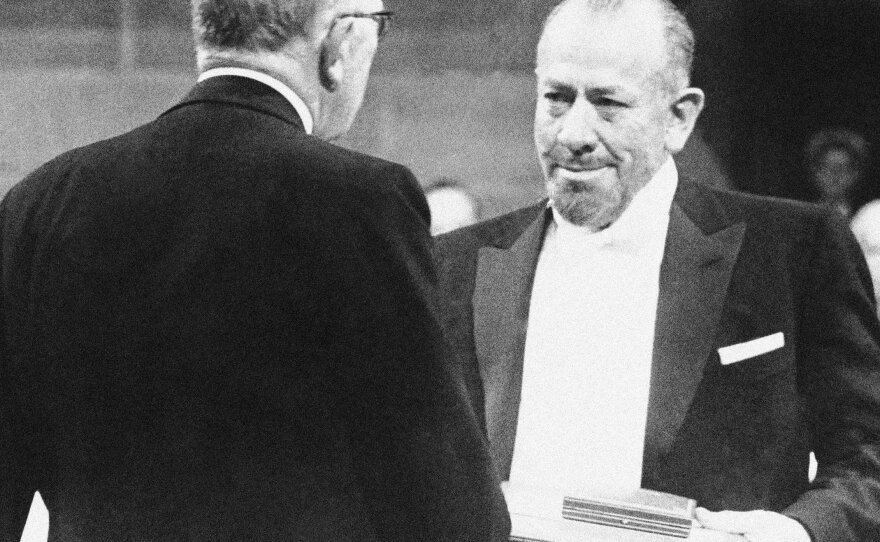 John Steinbeck receiving the 1962 Nobel Prize in Literature from King Gustav of Sweden, in Stockholm.