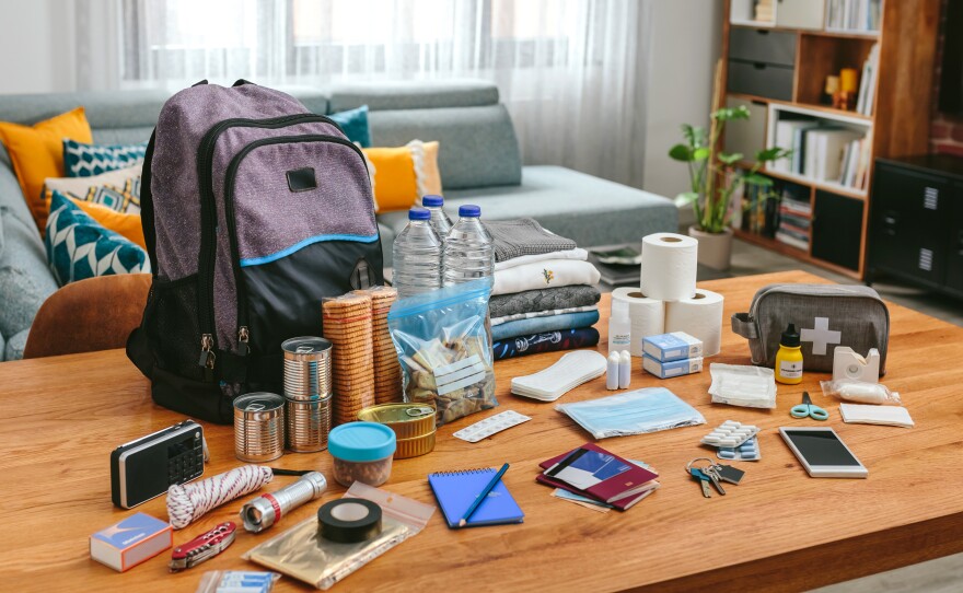 Store at least one gallon of water per person per day for several days.