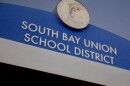 A sign for South Bay Union School District is shown at dusk, Dec. 8, 2025.