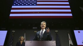 Lt. Gov. Gavin Newsom addresses the crowd at an election night party in Los Angeles, Nov. 6, 2018.