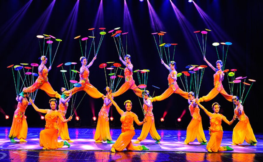 A photo of the Shanghai Acrobats of The People's Republic.