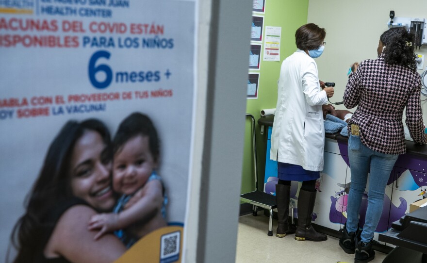 Dr. Acklema Mohammad checks a patient at El Nuevo San Juan Health Center in the Bronx in New York City in 2024. Community health clinics, like this one, are often located in immigrant communities and rely on Medicaid.