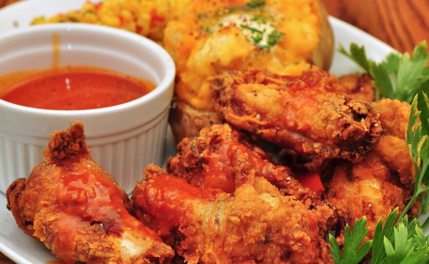 Blame sports bars for the chicken wing boom, especially on Super Bowl Sunday.