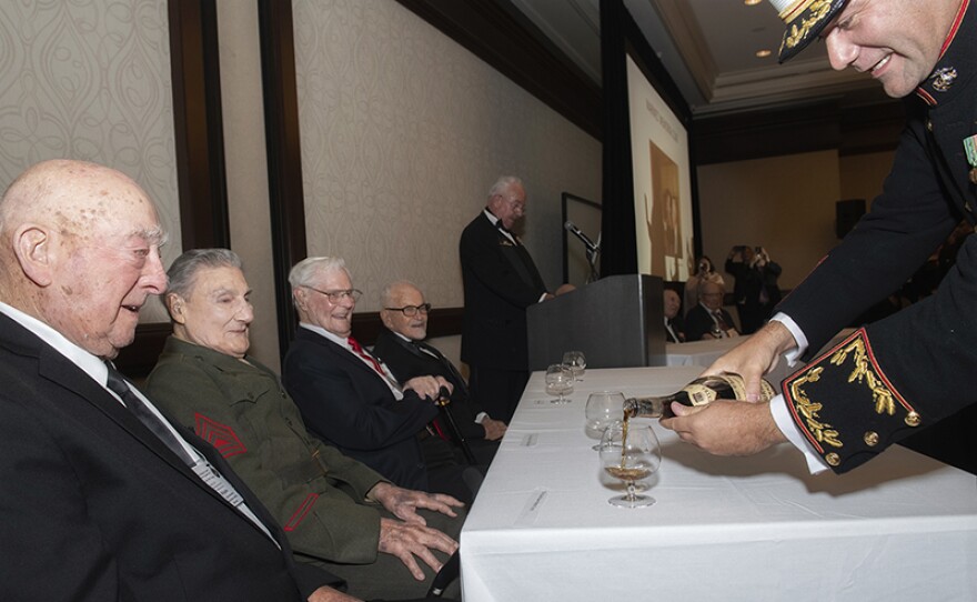 After 77 years, surviving WW2 Marines open a ceremonial bottle of cognac at a "Last Bottle" ceremony in North County.