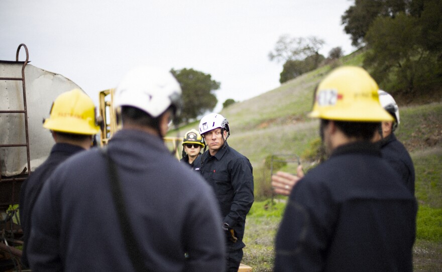 Newberry (center) attends a training with his Napa County Fire Rescue Team. The wellness program aims to not only provide support <em>after</em> an incident, but also help firefighters better process what they experience in the moment.