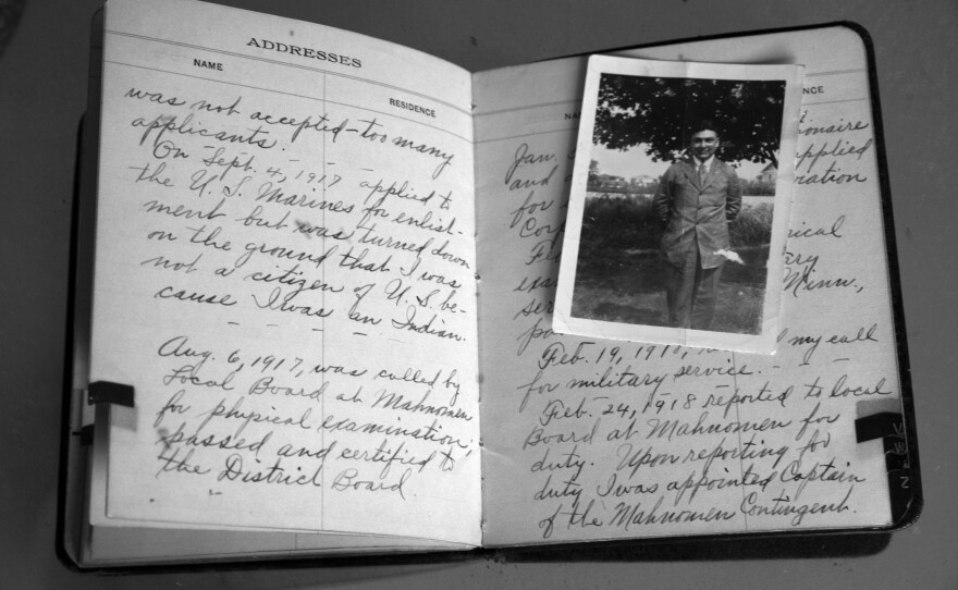 An excerpt from a journal entry that was found in John B. McGillis's address book conveyed his process for enlisting in WWI. He first applied for enlistment with the U.S. Marines but was denied on the ground that he was Native American and did not have U.S. citizenship. He was later called for military service in WWI, and was appointed Captain of the Mahnomen Contingent.
