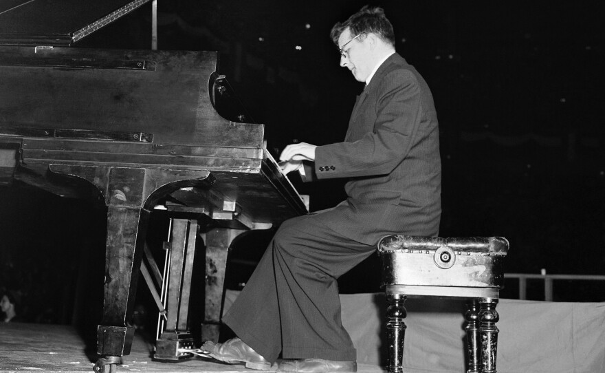 Dmitri Shostakovich, Russian composer-member of the Soviet delegation to the Cultural and Scientific conference for World Peace, plays the second movement of his Fifth Symphony at Madison Square Garden in New York City on March 27, 1949.