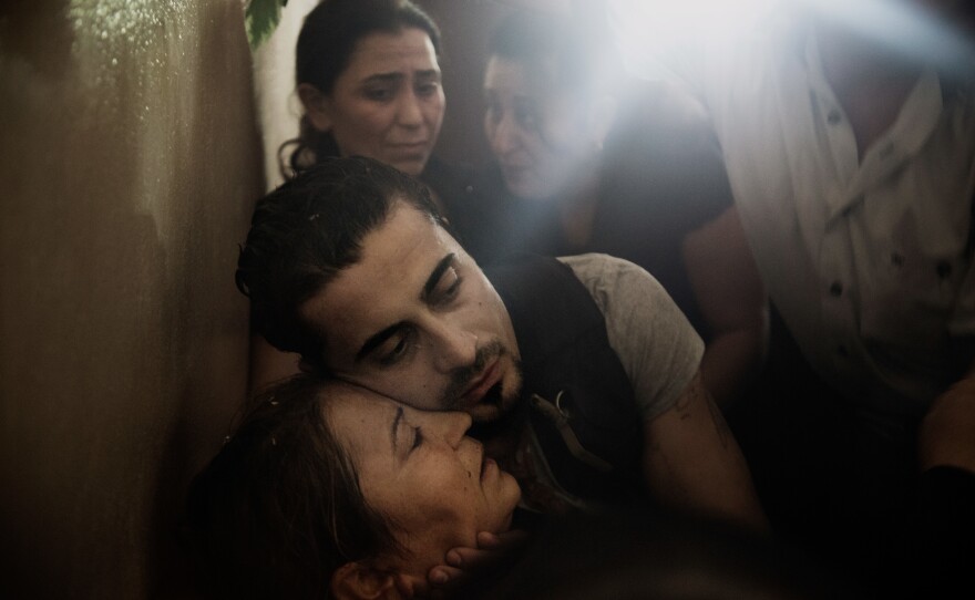 In the Syrian province of Latakia, a regime stronghold, a small village mourns the loss of a son, killed in an ambush at the other end of the country. The lieutenant was the first soldier to fall from this village of 125 people. September 30, 2013