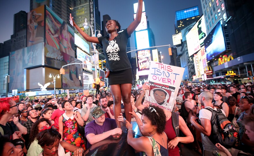Trayvon Martin supporters rally in Times Square on Sunday in New York City.