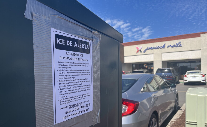 A sign altering ICE activity in Spanish is posted on an utility box outside of Peacock Nails in Lemon Grove, Oct. 20, 2026.