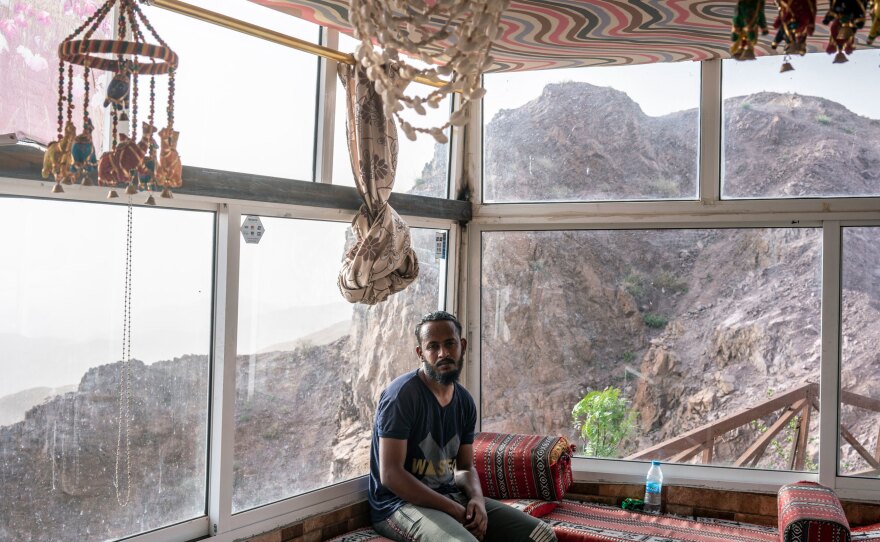 Awadallah Suleiman, a Sudanese migrant worker taking care of an empty souvenir shop on the road from Amman to Petra. The coronavirus pandemic has brought Jordan's vital tourism industry to a dramatic halt, and with it, the livelihoods of hundreds of thousands of workers.