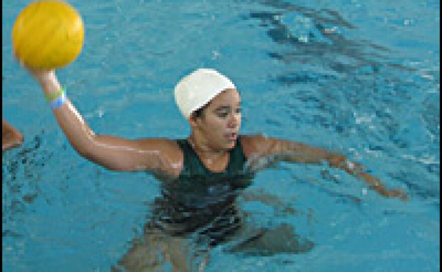 Mary Lou Rodriguez practices a shot in the Aquatorium.