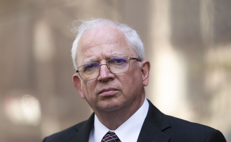 Attorney John Eastman stands outside the California State Bar Court in downtown Los Angeles. The State Bar is seeking to revoke Eastman's law license over his work on former President Donald Trump's effort to overturn the 2020 election.