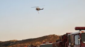 This undated photo shows fire crews assigned to battle the Border fire. 