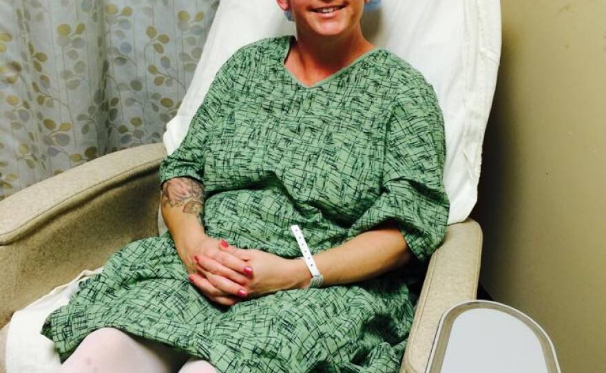 This 2014 photo shows Interfaith Community Services graduate Jennifer Kacizak in the hospital for breast cancer treatment.