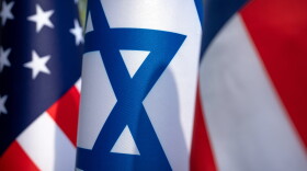 U.S. and Israel flags stand outside of the White House, Monday, July 27, 2026, in Washington.