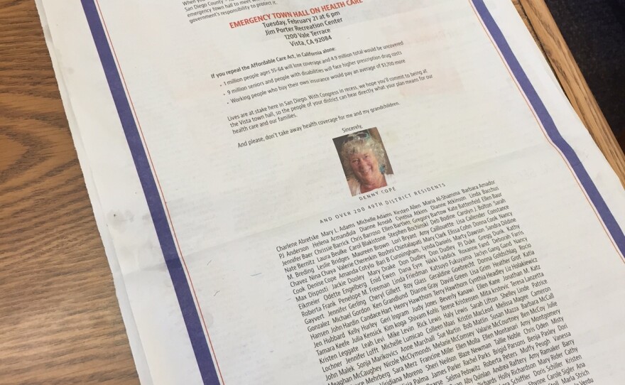 A full-page advertisement in The San Diego Union-Tribune invites Congressman Darrell Issa to attend a town hall meeting on Feb. 21 in Vista next week, Feb. 14, 2017.