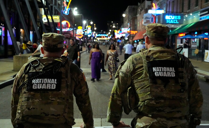 Members of the National Guard stand watch on Beale St., Friday, July 17, 2026, in Memphis, Tenn.