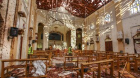 In this Sunday, April 21, 2019, a view of St. Sebastian's Church damaged in blast in Negombo, north of Colombo, Sri Lanka. Sri Lankan authorities blame seven suicide bombers of a domestic militant group for coordinated Easter bombings that ripped through Sri Lankan churches and luxury hotels which killed and injured hundreds of people. It was Sri Lanka's deadliest violence since a devastating civil war in the South Asian island nation ended a decade ago.