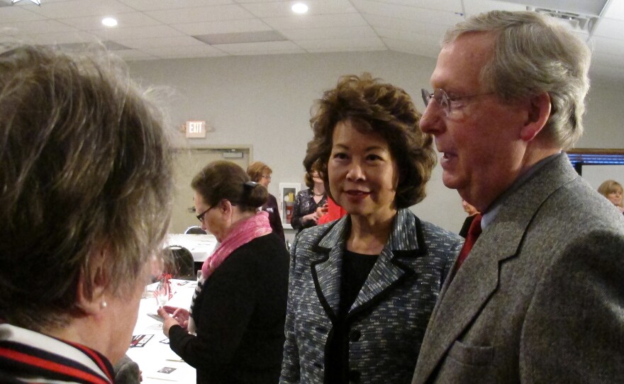 Sen. Mitch McConnell, right, and his wife, former Labor Secretary Elaine Chao, at a Republican dinner in Winchester, Ky., on March 2.