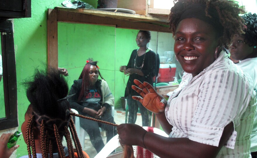 Angie Gardea depends on her job at a hair salon to put food on the table. But because of the Ebola outbreak, business has been slow. Customers are afraid to come in.