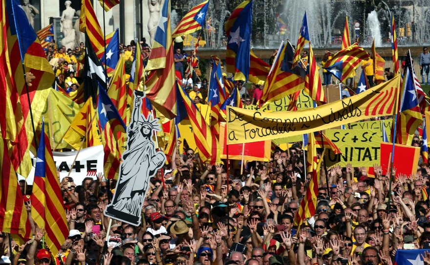 People rally in support of a referendum on independence at the Catalonia Square in Barcelona, Spain, on Oct. 19. A nonbinding referendum is set for this Sunday.