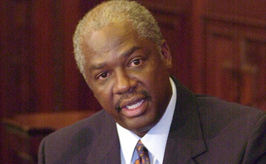 Ronnie White, then-chief justice-elect of the Missouri Supreme Court, talks with reporters in June 2003.