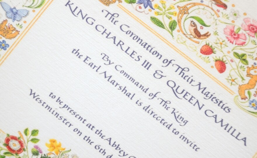 In this photo illustration, a souvenir replica invitation marking the coronation of King Charles III is seen on April 29 in London.