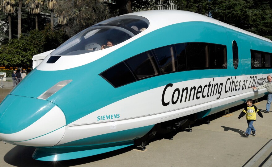 A full-scale mock-up of a high-speed train is on display at the Capitol in Sacramento, Calif., in 2015. The Trump administration is planning to cancel a $929 million federal grant for the project.