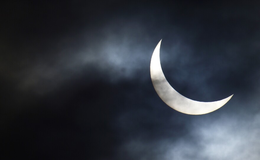 The partial solar eclipse as seen from Bridgwater, in south western England.