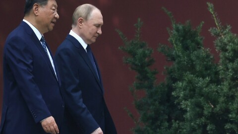FILE - Russian President Vladimir Putin, right, speaks with Chinese President Xi Jinping during a walk at the Zhongnanhai leadership compound in Beijing, China, Sept. 2, 2025.