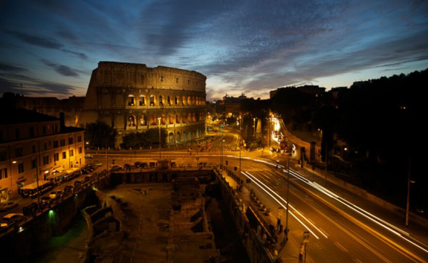 The Colosseum makes a powerful impression on the Roman skyline.