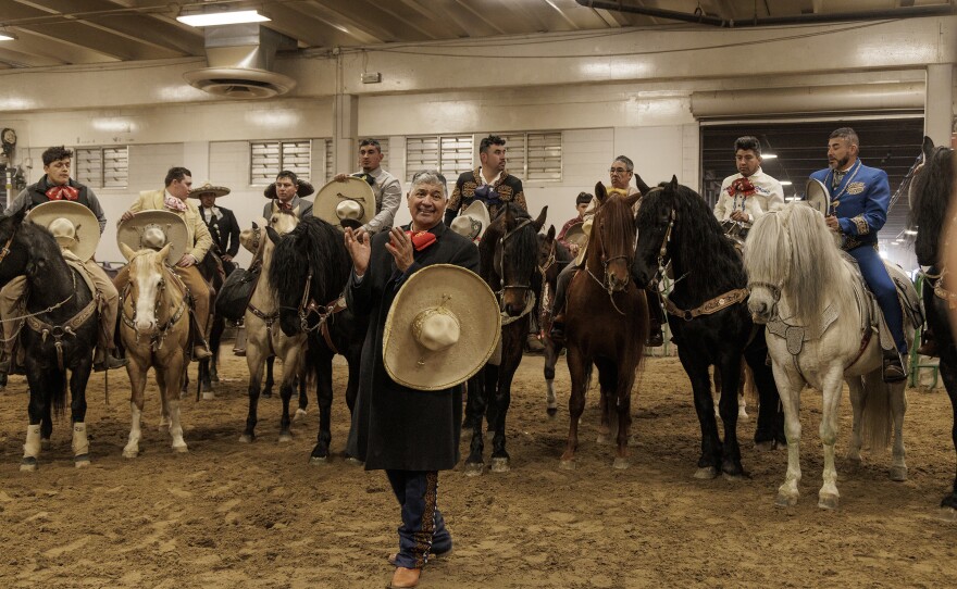 Gerardo "Jerry" Diaz, a fourth-generation champion charro, addresses the charros and performers backstage at the Mexican Rodeo Extravaganza. Jerry and his family produce the event every year.