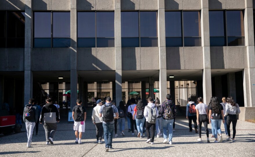 Students walk across campus at California State University East Bay on February 25, 2020. CSU is requiring that all students be vaccinated by Sept. 30.