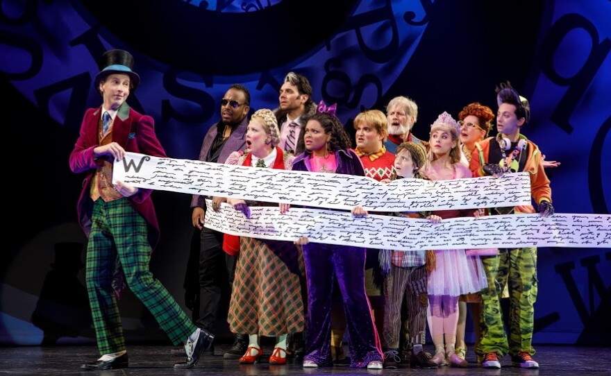 A 2019 photo of the cast of "Charlie and the Chocolate Factory." The kids, except for Charlie, are played by adults.