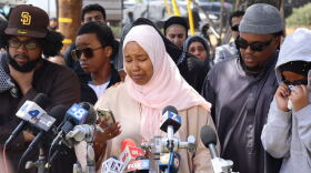 Hawaa Abdullah, daughter of security guard Amin Abdullah, spoke at a press conference on May 19, 2026.