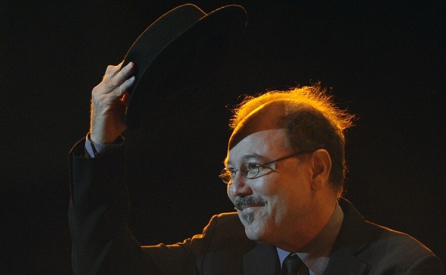 Panamanian salsa singer Ruben Blades waves to the crowd before performing during the final round of Tango Salon competition at the 8th Tango Dance World Championship in Buenos Aires on August 30, 2010. MABROMATA/AFP/Getty Images)