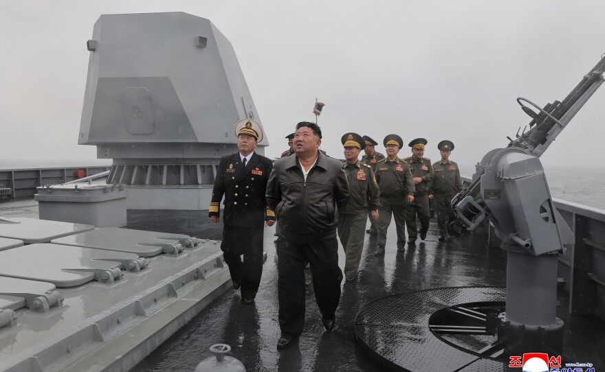 In this photo provided on May 8, 2026, by the North Korean government, its leader Kim Jong Un, center, visits the destroyer Choe Hyon to review its maneuverability off North Korea's west coast, Thursday, May 7, 2026. Independent journalists were not given access to cover the event depicted in this image distributed by the North Korean government. The content of this image is as provided and cannot be independently verified. Korean language watermark on image as provided by source reads: "KCNA" which is the abbreviation for Korean Central News Agency.