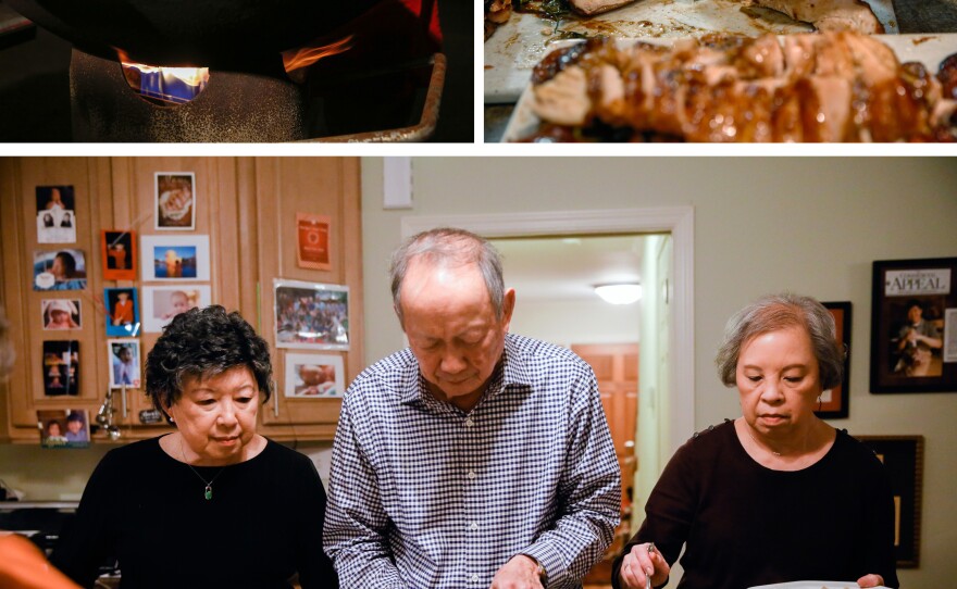 (Top left) Gilroy Chow makes fried rice in the family's wok in the driveway of their home in Clarksdale, Miss. (Top right) All the meat served was cut up "bite sized" so that guests wouldn't need a knife at the table, explains Gilroy. (Bottom) From left: Sally Chow, Gilroy and Alice Chow serve dinner.