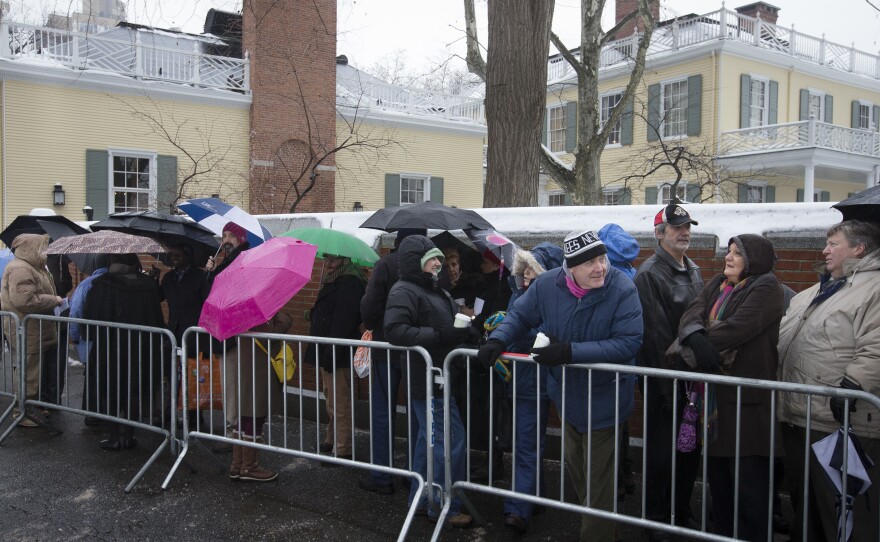 Visitors wait in the cold outside Gracie Mansion as newly elected New York Mayor Bill de Blasio, not pictured, holds an open house and photo opportunity with the public on Jan. 5.
