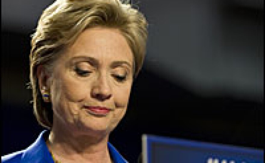 Sen. Hillary Clinton gives a speech Tuesday at Baruch College in New York. Clinton said she had made no decision yet on the future of her candidacy for president after her rival Barack Obama clinched the Democratic party nomination.