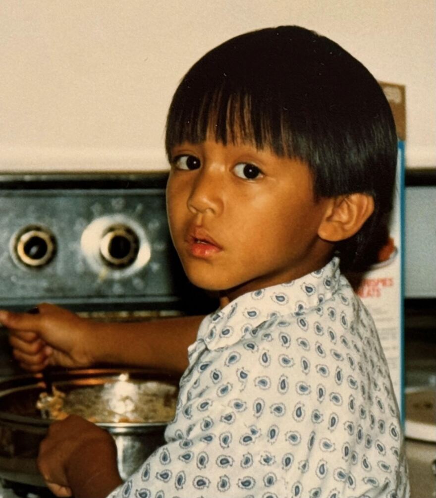Phillip Esteban's first memories of food are tied to cooking with his grandmother when he was a young child. Undated photo.