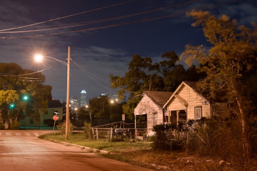 In recent years, developers and activists have battled over gentrifying and preserving the historic Third Ward. Here, the Houston skyline can be seen from a row of shotgun houses on the north end of the Third Ward.