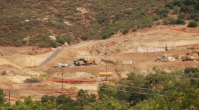 Construction vehicles are shown parked on the future site of the Hidden Valley Ranch housing development in Poway, California on April 22, 2026. The California Attorney General and San Pasqual Band of Mission Indians are suing Poway alleging environmental review violations involving the discovery of tribal remains.