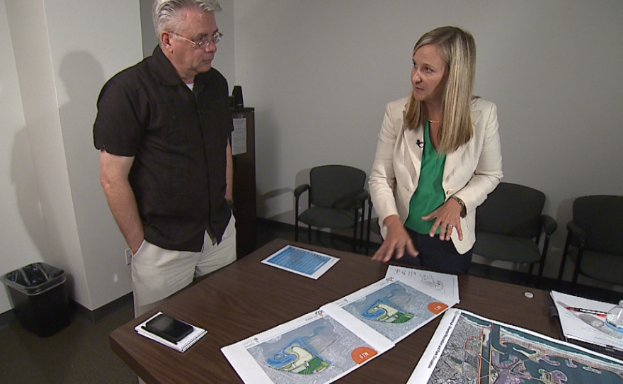 City planner Alyssa Muto gives KPBS Reporter Erik Anderson an explanation of the two redevelopment alternatives for the northeast corner of Mission Bay on June 28, 2017