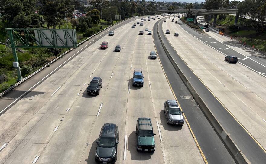 Cars drive through a section of the I-5 freeway that cuts through Balboa Park, Feb. 8, 2024.